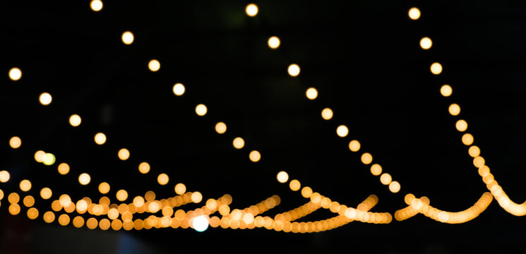 blur decorative lights bokeh colorful for background, decorative string lights outdoor at night time