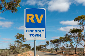 Australian road sign RV friendly Town in rural area of Australian Outback Recreation Vehicle Welcome as caravans and mptprhomes