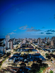 The city under a blue sky at night