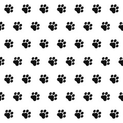 Naklejka na ściany i meble seamless pattern footprints of cat. Black animal tracks. Vector texture for textiles and wallpaper.