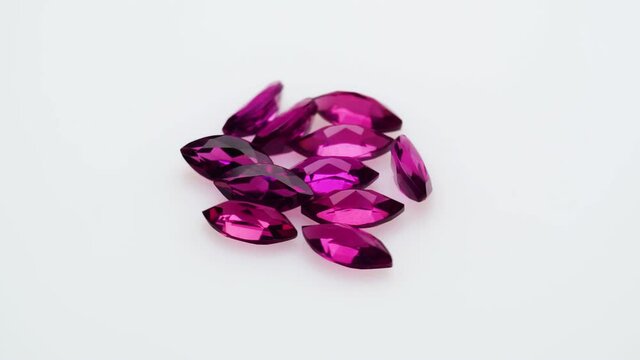 natural red rhodolite gemstone on the turning table