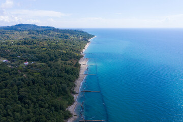 The Black Sea coast from the height of the flight. Aerovideo. New Athos, Abkhazia, Georgia.