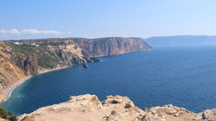 Beautiful view of the coast of the turquoise sea at Cape Fiolent, Crimea. The concept of tranquility, silence and unity with nature