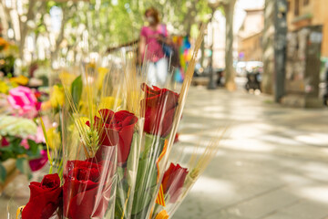 Close-up of roses displayed in an urban florist's shop