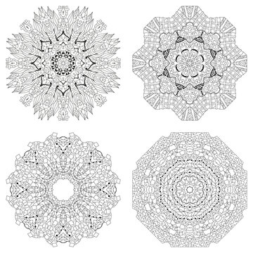 Hand drawn zentangle set of 4 mandalas for coloring page.
