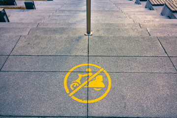 No Parking sign for Motorcycle on the floor of the modern building