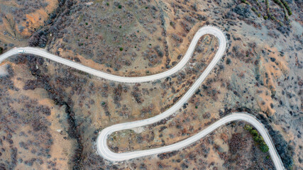 Coast of the Crimea peninsula, rocky mountains, aerial view of the Novy Svet sea resort, mountain serpentine