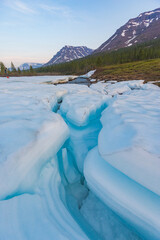 Snow and ice on the banks of the river Hoisey. Putorana Plateau, Taimyr