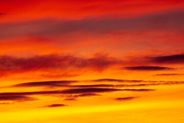 Colorful sunset with clouds in the sky.