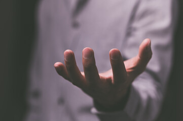 People pretending to spread their hands to hold things