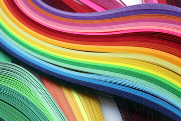 Abstract color wave rainbow strip paper on horizontal background.