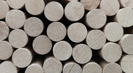 Cylindrical wooden slats. Ligth background