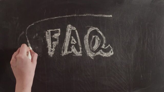Abbreviation faq is drawn in voluminous letters in a callout for text by hand on a chalkboard, timelapse. Concept of frequently asked questions.