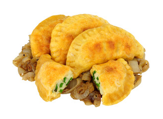 Group of potato and cheese filled Pierogi dumplings with fried onions isolated on a white background
