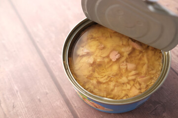 canned tuna on wooden table ,