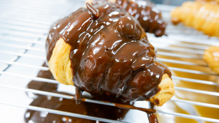 croissant on top sauce chocolate caramel