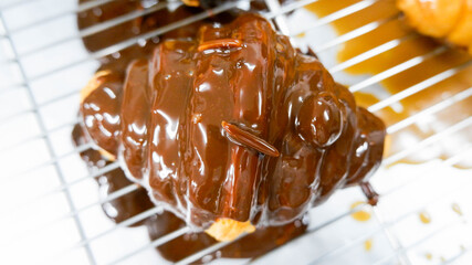 croissant on top sauce chocolate caramel