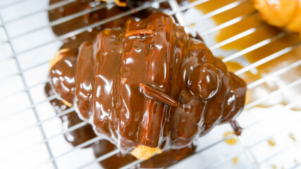  croissant on top sauce chocolate caramel