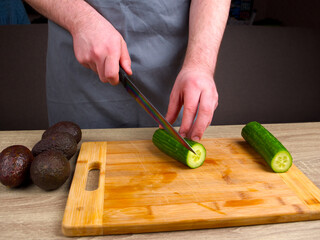 Young chef learning to cook rolls from different products, making rolls and sushi at home, japanese food concept