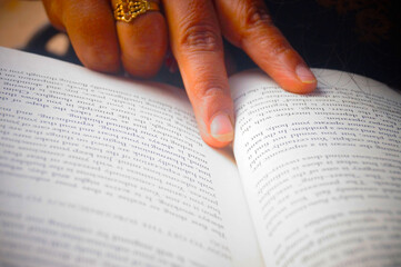 hand with a book 