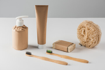 Set of shampoo, toothpaste, handmade soap, loofah sponge and toothbrushes