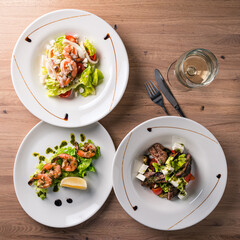 Mixed seafood salad with shrimps on the table