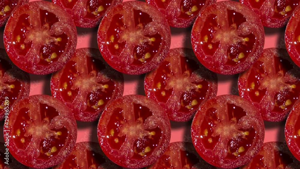 Poster geometric pattern with two layers of tomato slices on a coral background. simple motion graphic food