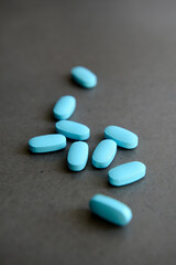 Pharmaceutical medicine pills over dark background