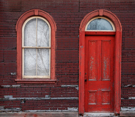 Fototapeta na wymiar Old red wooden door and windows railway station Lakefield Ontario