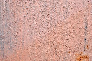 The metal surface painted with multicolored colors speckles and stripes is sloppy