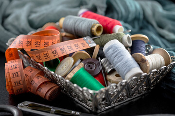 Fototapeta na wymiar Threads, needles and sewing items.
