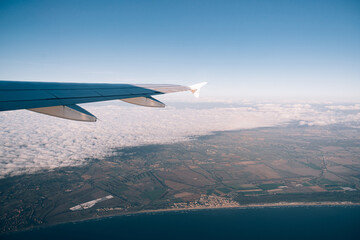 Naklejka na ściany i meble View from the plane window on the Ligurian coast of Italy