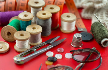 Threads, needles and sewing items.