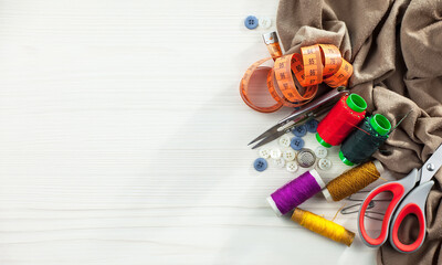Threads, needles and sewing items.