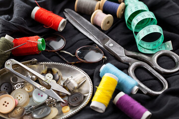 Threads, needles and sewing items.