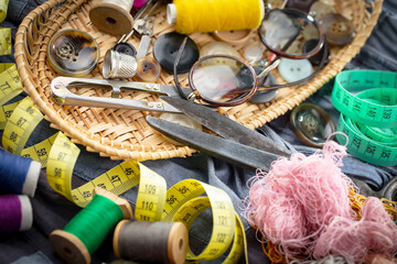 Threads, needles and sewing items.