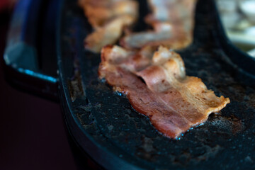Close-up bacon  in Non-stick grill pan, Korean BBQ.