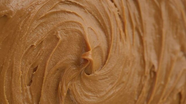 classic peanut butter close up rotate. vertical video. 4K UHD video