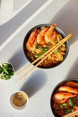 Ramen soup with prawns and green onions.