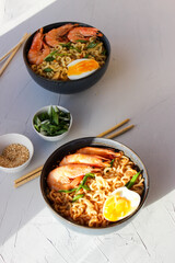 Ramen soup with prawns and green onions.