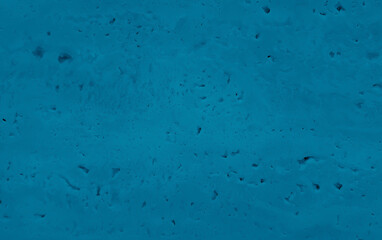 natural blue travertine stone texture background. travertine marble tile with rough surface. Wall of travertine with stone layers of different beige colors. close up architecture tile background.