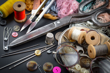 Threads, needles and sewing items.