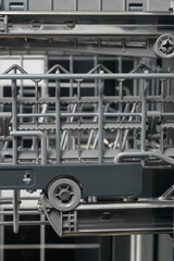 close-up of mechanisms, grid extension system, dishwasher