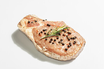 Raw pork loin steak isolated on white background