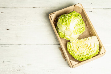 Fresh young cabbage in a rustic arrangement