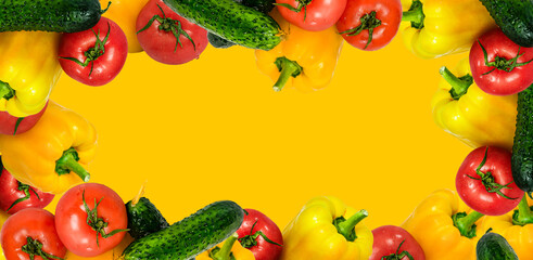 Frame of vegetables on a yellow background