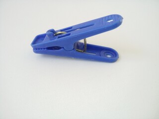 blue clothes peg
