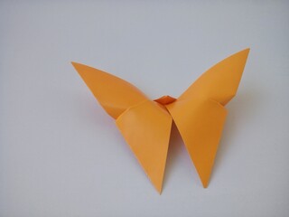 orange origami paper butterfly 
