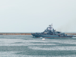 Russian military ship warship in bay.
