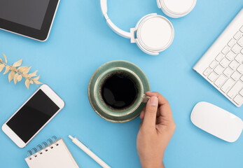 coffee cup and moka pot on black table backgroun, coffee shop.